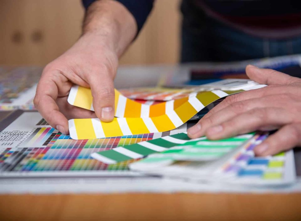 person preparing for 3-color flexographic printing
